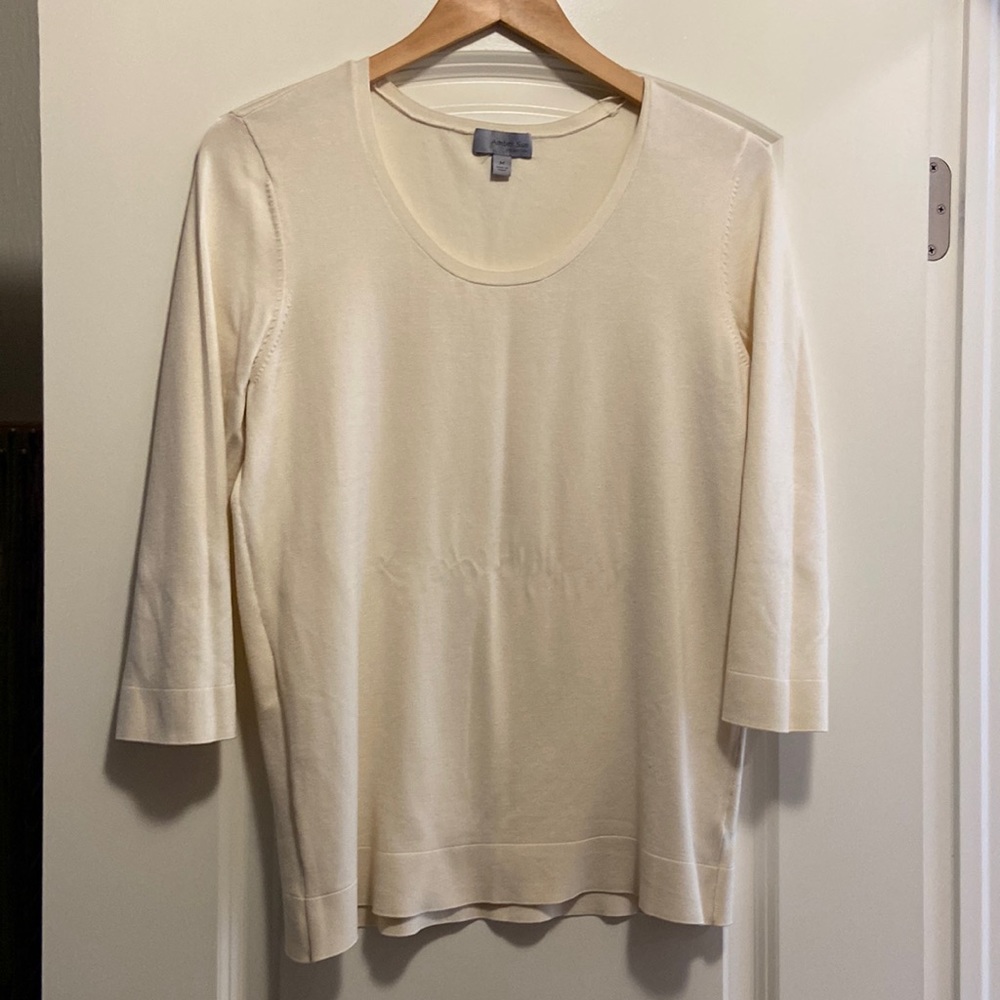 Womens like new. Size medium. Cream color. Small blemish - see photo.